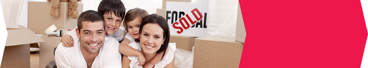 Moving Family with moving boxes in the background