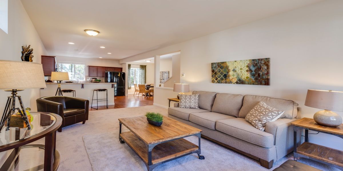 Open-concept living room and kitchen with modern decor